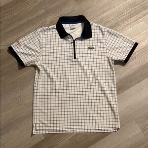 Lacoste Men's Polo with Black and White Checkered Design